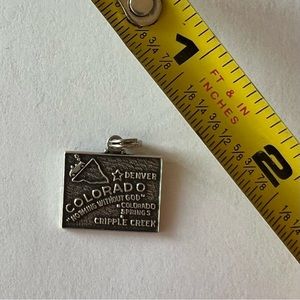 Vintage, sterling silver Colorado state charm